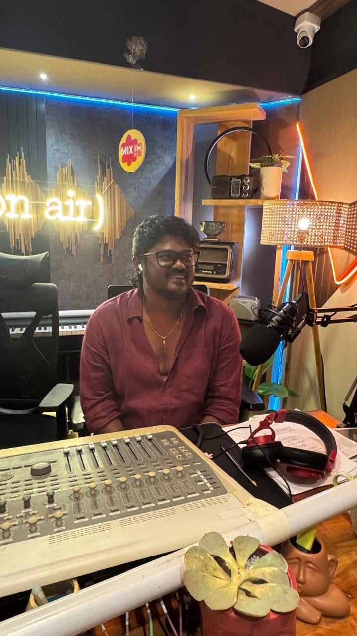 Art director Siva Sankar at the console in a recording studio